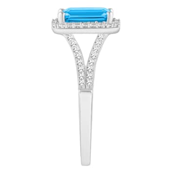 8x6mm Emerald Cut Blue Topaz 1/4 ctw Diamond Rhodium Over Sterling
Silver Halo Ring