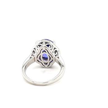 Tanzanite 12x10mm Oval and White Zircon Rhodium Over Sterling Silver Ring