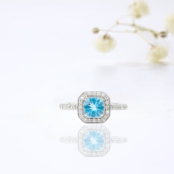 Lab Grown Diamond and Paraiba Blue Apatite Rhodium Over Sterling Silver
Cushion Cut Halo Ring