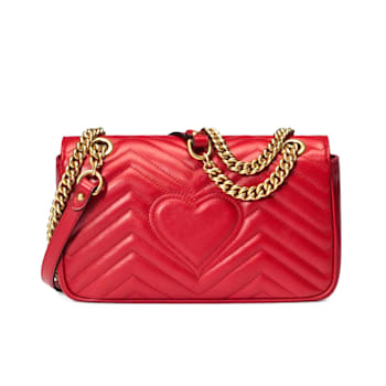 Gucci bag with heart on back hot sale
