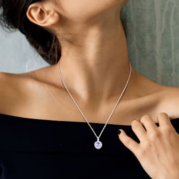 1.87ctw Tanzanite, White Topaz And Diamond Accent 14k White Gold Pendant
With Chain