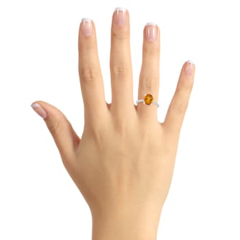 10x8mm Oval Citrine and 1/10 ctw Diamond Rhodium Over Sterling Silver Ring