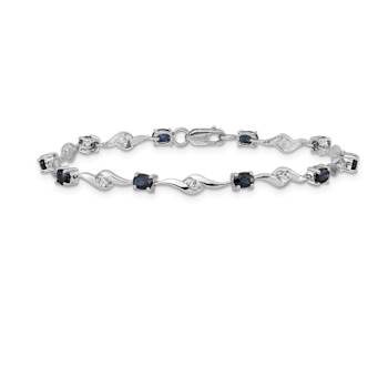 Rhodium Over 10k White Gold Oval Shaped Blue and Round Shaped White
Sapphire Bracelet