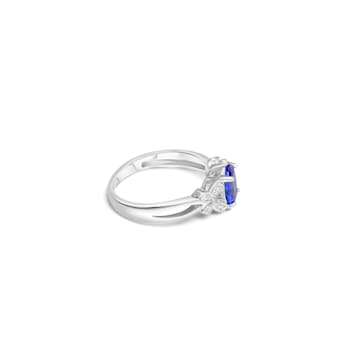 8x6mm Oval Tanzanite and White CZ Rhodium Over Sterling Silver Ring, 1.19ctw