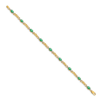 14k Yellow Gold and Rhodium Over 14k Yellow Gold Diamond and Oval
Emerald Bracelet