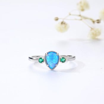 Pear Shape Lab Created Blue Opal and Round Green Nanocrystal Sterling
Silver Opal Ring 3-Stone Ring