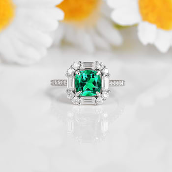 Green Lab Created Emerald and Moissanite Rhodium Over Sterling Silver
Halo Design Ring