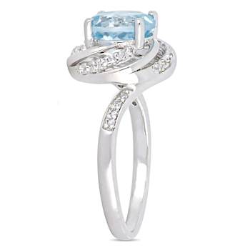 2.50ctw Sky Blue and White Topaz with Diamond Accent Swirl Ring in
Sterling Silver