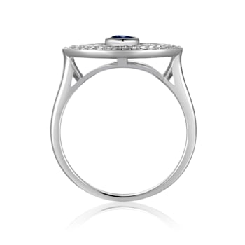 Blue Sapphire with Moissanite Accents Rhodium Over Sterling Silver Evil
Eye Halo Ring