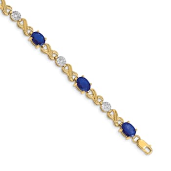 14k Yellow Gold and Rhodium Over 14k Yellow Gold Diamond and Sapphire
Infinity Bracelet