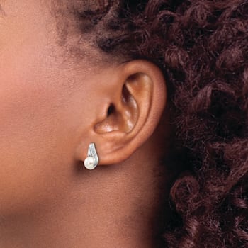 Rhodium Over 14K White Gold 6-7mm Button Freshwater Cultured Pearl
0.02ctw Diamond Earrings