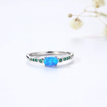 Lab Created Blue Opal with Green Nanocrystal Accents Rhodium Over
Sterling Silver Ring