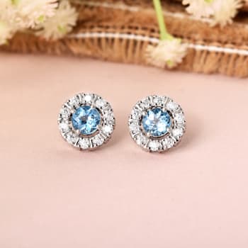 Round Blue Topaz with Moissanite Accents Rhodium Over Sterling Silver
Halo Earrings