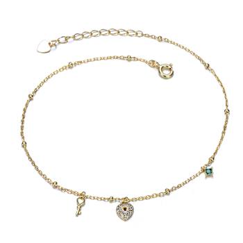 Emerald Color CZ Heart And Key Charm Bracelet In 14K Gold Over Brass