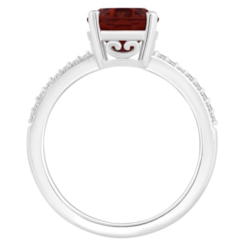 10x8mm Oval Garnet and 1/10 ctw Diamond Rhodium Over Sterling Silver Ring