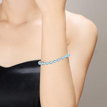 Blue Topaz Color CZ Pear Shape Tennis Bracelet In White Rhodium Over Brass