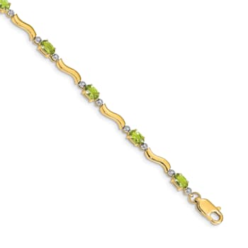 14k Yellow Gold and Rhodium Over 14k Yellow Gold Fancy Diamond and
Peridot Bracelet