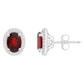 7x5mm Oval Garnet 1/5 ctw Diamond Rhodium Over Sterling Silver Halo Stud Earrings