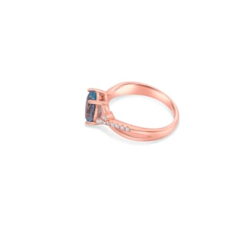 9x7mm Oval Aquamarine and White CZ 18K Rose Gold Over Sterling Silver
Ring, 1.54ctw