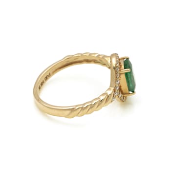 1.09Ctw Emerald with 0.17Ctw Ring in 14K YG