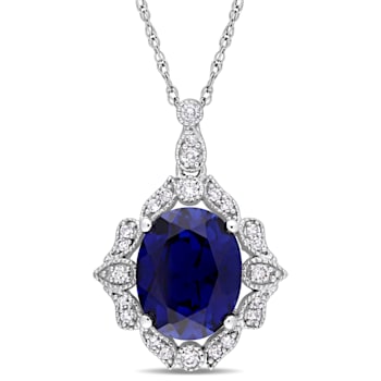 Lab Created Blue Sapphire and White Diamond 10k White Gold Pendant With
Chain 4.32ctw