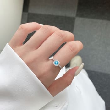 Lab Grown Diamond and Paraiba Blue Apatite Rhodium Over Sterling Silver
Cushion Cut Halo Ring