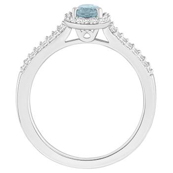 6x4mm Oval Aquamarine 1/4 ctw Diamond Rhodium Over Sterling Silver Halo Ring