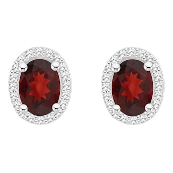 7x5mm Oval Garnet 1/5 ctw Diamond Rhodium Over Sterling Silver Halo Stud Earrings