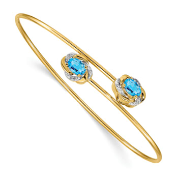 14k Yellow Gold and Rhodium Over 14k Yellow Gold Polished Diamond and
Blue Topaz Flexible Bangle