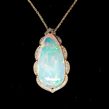 Ethiopian Opal Pear Shape Cabochon and Round Diamond 14K Yellow Gold
Pendant with Chain, 18.79ctw