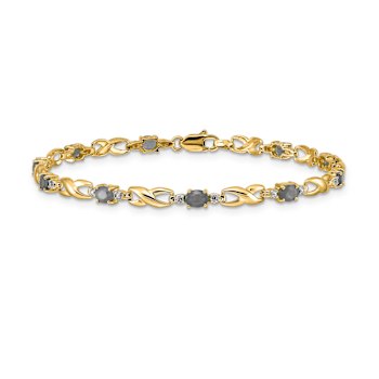 10k Yellow Gold and Rhodium Over 10k Yellow Gold Diamond and Oval
Emerald Bracelet