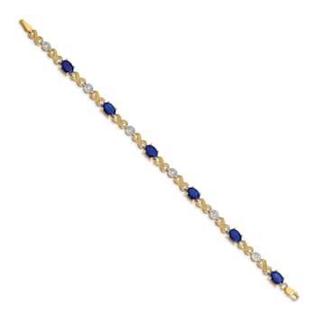 14k Yellow Gold and Rhodium Over 14k Yellow Gold Diamond and Sapphire
Infinity Bracelet