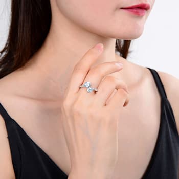 Pear Shape Blue Topaz with White Topaz Accents Sterling Silver Bypass
Ring, 1.19ctw