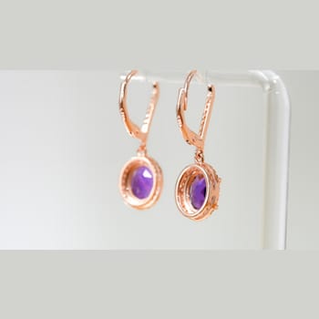 Amethyst and CZ 2.98 Ctw Oval 18K Rose Gold Over Sterling Silver Drop
Earrings Jewelry.