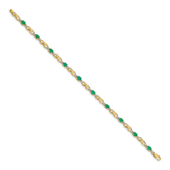 14k Yellow Gold and Rhodium Over 14k Yellow Gold Diamond and Oval
Emerald Bracelet