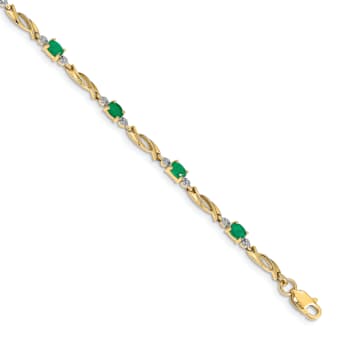 14k Yellow Gold and Rhodium Over 14k Yellow Gold Diamond and Oval
Emerald Bracelet