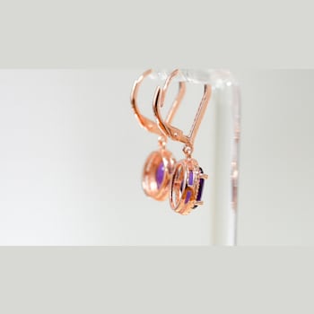 Amethyst and CZ 2.98 Ctw Oval 18K Rose Gold Over Sterling Silver Drop
Earrings Jewelry.