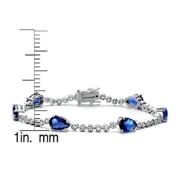Sapphire Color CZ Pear Shape Tennis Bracelet In White Rhodium Over Brass