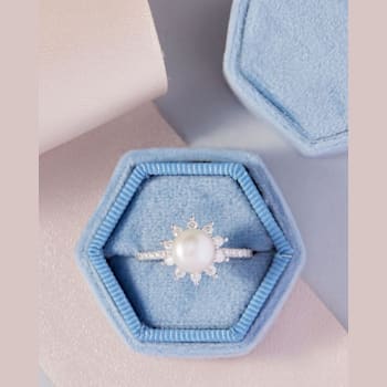 Freshwater Pearl and Moissanite Rhodium Over Sterling Silver Halo Flower
Design Ring
