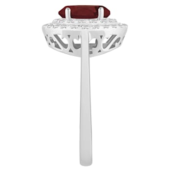 8x6mm Oval Garnet And White Topaz Accents Rhodium Over Sterling Silver
Double Halo Ring
