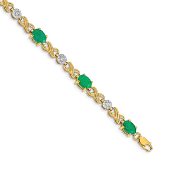 14k Yellow Gold and Rhodium Over 14k Yellow Gold Diamond and Emerald
Infinity Bracelet