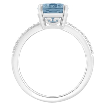 10x8mm Oval Sky Blue Topaz and 1/10 ctw Diamond Rhodium Over Sterling
Silver Ring