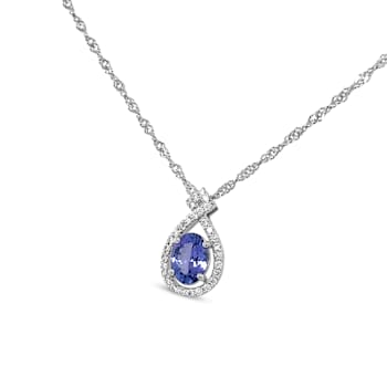 Rhodium Over Sterling Silver 8x6mm Oval Tanzanite and Cubic Zirconia
Pendant 1.25ctw