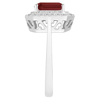 8x6mm Emerald Cut Garnet And White Topaz Accents Rhodium Over Sterling
Silver Double Halo Ring