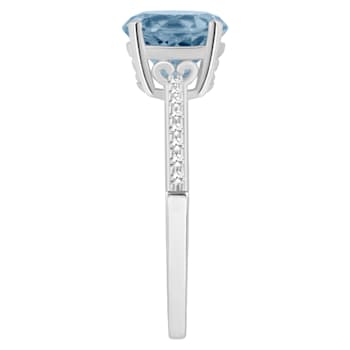 8mm Round Sky Blue Topaz and 1/10 ctw Diamond Rhodium Over Sterling
Silver Ring