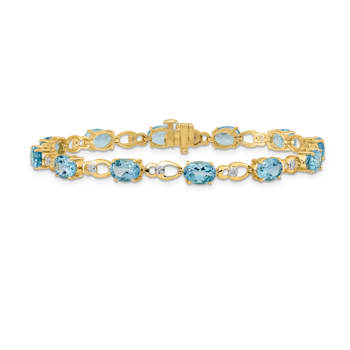 14K Two-tone Gold with rhodium over 14k yellow gold Blue Topaz and
Diamond Bracelet