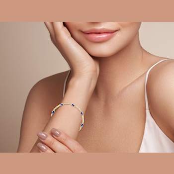 Sterling Statements 14K Yellow Gold Over Sterling Silver Blue CZ Station
Curb Chain Bracelet