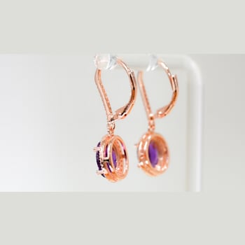 Amethyst and CZ 2.98 Ctw Oval 18K Rose Gold Over Sterling Silver Drop
Earrings Jewelry.