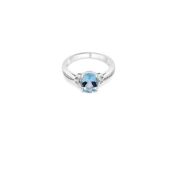 9x7mm Oval Aquamarine and White CZ Rhoidum Over Sterling Silver Ring, 1.53ctw