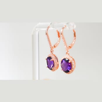 Amethyst and CZ 2.98 Ctw Oval 18K Rose Gold Over Sterling Silver Drop
Earrings Jewelry.
